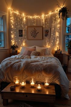 a bedroom with lights on the wall and a bed