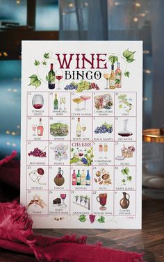 a wine themed calendar is displayed on a table