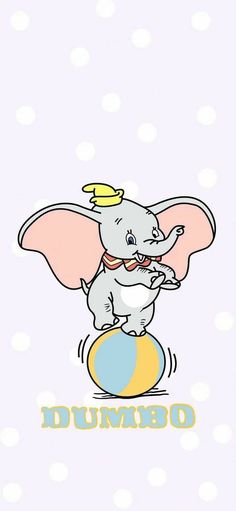 an elephant on top of a ball with the word dumbo written in it's center