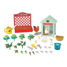 a play set with chicken, potted plant and birdhouse