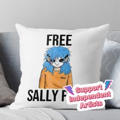 a pillow with an image of a person wearing blue hair and text that reads, free salty f support independent artists