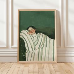 a painting of a man wrapped in a blanket on a wooden floor next to a wall