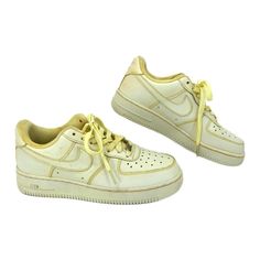 Dip Your Toes Into A Sunny Daydream With These Pastel Yellow Nike Air Force 1 Sneakers. Hand-Dyed And Radiating A Warm, Soft Glow, They're The Perfect Pair To Brighten Up Any Outfit. Whether You're Walking The City Streets Or Shooting Hoops, These Kicks Will Keep You Comfy And Stylish All Day Long. And The Best Part? They're As Versatile As They Are Vibrant, Ready To Rock Any Season, Any Occasion. So Why Not Lace Up And Let These Sneakers Bring A Pop Of Joy To Your Everyday Adventures? Features: - Made In Vietnam For Assured Quality - Crafted From Durable Textile Material - Classic Lace-Up Closure For Secure Fit - Versatile Round Toe Design - Solid Pattern For A Clean, Minimalist Look - Inv Casual Yellow Nike Air Force 1, Artistic Yellow Low-top Sneakers, Yellow Nike Air Force 1 For Streetwear, Yellow Nike Air Force 1 Lace-up For Streetwear, Yellow Fade-resistant Sneakers For Streetwear, Air Force 1 Sneakers, Nike Yellow, Yellow Nikes, Textile Material