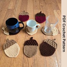 several crocheted coasters with coffee cups on the floor next to each other