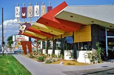 the outside of a restaurant with an awning