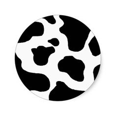 a black and white cow print circle sticker