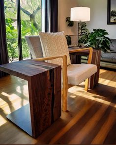 a living room filled with furniture next to a large window covered in plants and greenery