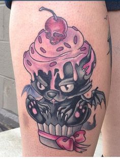 a tattoo on the leg of a person with an ice cream sundae in it