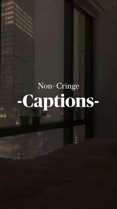 the words captions are in front of a cityscape with skyscrapers at night