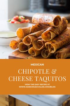 mexican chipotle and cheese taquitos on a cutting board