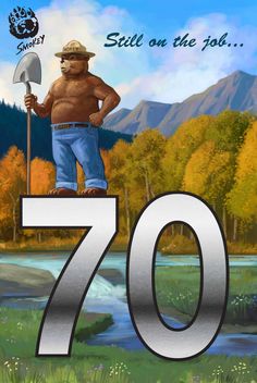 an image of a man holding a shovel and standing on the number seventy with mountains in the background