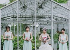 the bridesmaids are posing for pictures in their dresses