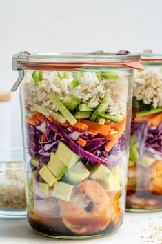 two glass jars filled with different types of food