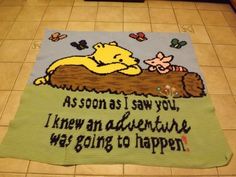 a winnie the pooh rug with words written on it