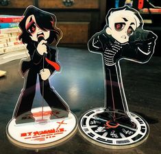 two paper cutouts of the characters michael jackson and jack skellinger on top of each other