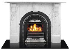 a white fireplace with a black mantle and fire in the center, on top of a black table