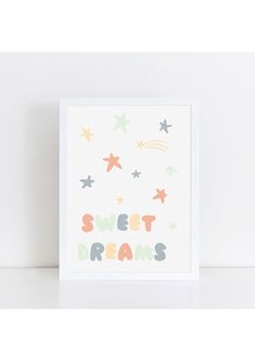 a card with the words sweet dreams written in multicolored stars and rainbows