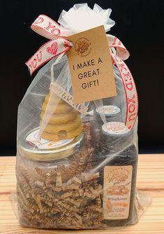 a bag filled with lots of food sitting on top of a wooden table