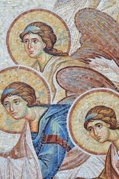 an artistic mosaic with three women and two birds on the side of a church wall