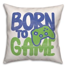 a pillow with the words born to game printed on it