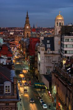 an aerial view of a city street at night