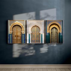 three doors are hanging on the wall in an empty room with wood flooring and blue walls