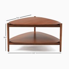 a wooden coffee table with measurements for the top and bottom shelf on each side,