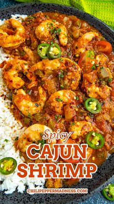 spicy cajun shrimp with white rice and jalapeno peppers on the side