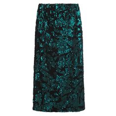 Meleka Sequin Skirt – Sparkle Through the Winter Party Season  Turn heads at every event with the stunning Meleka Sequin Skirt, a must-have for the winter party season. This midi-length skirt is available in two dazzling colours—Striking Red and Emerald Green—both guaranteed to make a statement. As a key piece in our All That Glitters at Nooki collection, the Meleka Skirt brings the ultimate mix of glamour and fun to your wardrobe.  Pair it with the Edelweiss Gilet in red or black for a sexy glam look, or go for laid-back elegance with a cute black jumper. However you style it, the Meleka Sequin Skirt ensures you’ll be the star of every winter party! 95% POLYESTER/5% ELASTANE LINING: 97% POLYESTER/3% ELASTANE  DRY CLEAN ONLY Sparkle Skirt, Red Or Black, Black Jumper, Stocking Fillers For Her, Winter Party, Fur Scarf, Midi Length Skirts, All That Glitters, Knitwear Tops