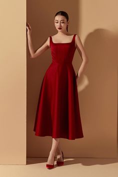 Indulge in elegance and luxury with our Dress. Crafted with the finest taffeta, this dress boasts an A-line silhouette and a flattering square neckline. Perfect for your next special occasion, this dress exudes sophistication and effortless style. Velvet Frocks For Women, Red A Line Dress, Elegant Red Dress, Stylish Maxi Dress, Frock Fashion, Mean Blvd, Red Dresses Classy, Velvet Midi Dress, Square Neck Dress