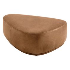 a large brown ottoman sitting on top of a white floor