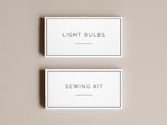 two business cards with the words light bulbs and sewing kit printed on them in black ink