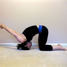 a man is doing a handstand on the floor