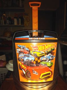 an arcade machine with hot wheels on it