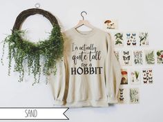 Tall for a Hobbit Sweatshirt Short Joke Sweatshirt Lord of - Etsy Lord Of The Rings Shirt, Grey Wardrobe, Rings Of Power, Circuit Ideas, Short Jokes, Book Clothes, Awesome Outfits, Cricut Joy, Stunning Shoes