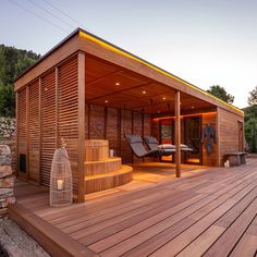 a wooden deck with a hot tub next to it