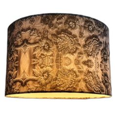 a lamp shade with an intricate design on it