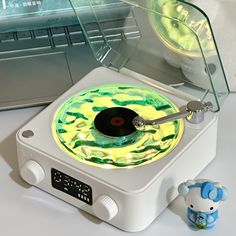 an old record player is sitting on the table