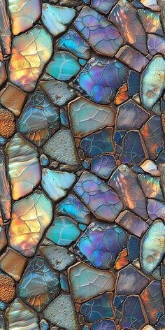 an abstract mosaic pattern made up of blue, yellow and orange stones with different colors