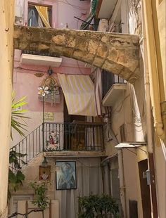 a narrow alleyway in an old european city