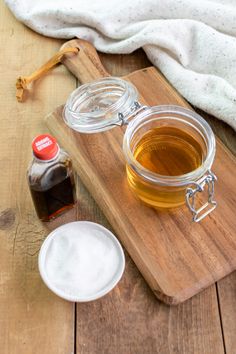 an image of vanilla syrup on a cutting board with ingredients to make it tasteful