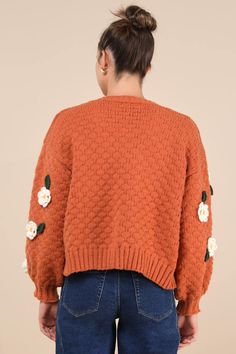 We know that the Lulus Chosen Charm Rust Orange Knit Embroidered Cardigan Sweater will always be your first pick when it comes to showing off your style! Cozy, heavy-gauge knit shapes this eye-catching cardigan sweater that features three-dimensional, crocheted floral embroidery throughout. Long balloon sleeves (with drop shoulders and fitted cuffs) frame a wide-cut, open-front bodice. Ribbed knit accents the neckline, cuffs, and hem. Fit: This garment fits true to size. Length: Size medium meas Orange Knit, Orange Cardigan, Embroidered Cardigan, Long Balloons, Embroidered Sweater, Rust Orange, Balloon Sleeves, Floral Embroidery, Ladies Tops Fashion