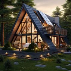 a - frame house in the woods is lit up at night