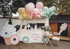 an ice cream truck is decorated with balloons and pastel colors for a birthday party