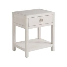 a small white table with one drawer