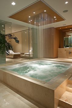 an indoor jacuzzi is shown in the middle of a room with steps leading up to it