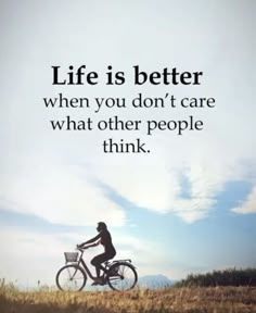 a person riding a bike with the words life is better when you don't care what other people think