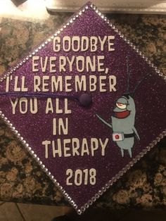 a purple graduation cap that says goodbye everyone i'll remember you all in therapy