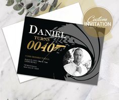 a black and gold birthday party card with an image of a man in the middle