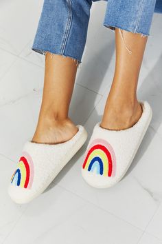 Start off your day the perfect way, with these rainbow-graphic slippers (and a cup of coffee). Soft and fuzzy on the inside and the outside, these slippers will keep you warm and cozy whether you're working from home or getting ready for a good night's rest. Size fit: True to size Pattern type: Graphic Type: Slippers Toe: Round toe Heel height: Flats Heel shape: Flats Material: Faux fur top/rubber sole Imported MMShoes has made a name for itself in European and Asian markets through footwear tra Rainbow Plush, Faux Fur Top, Rainbow Graphic, Fur Top, Comfy Slippers, Slippers Cozy, Teddy Bear Plush, High Quality Shoes, A Cup Of Coffee